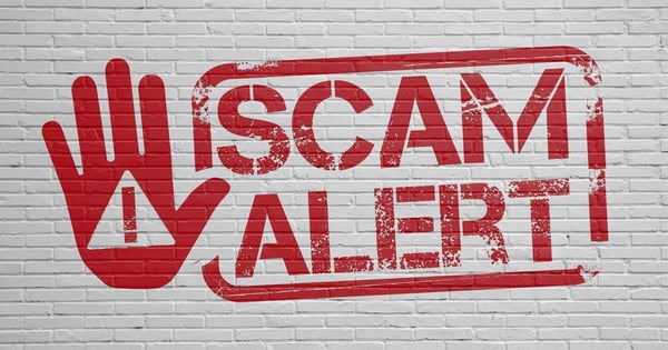 scam-alert-wall